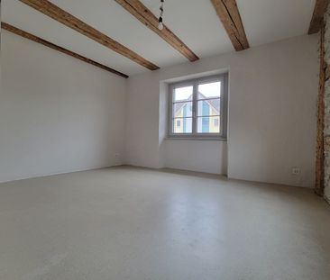 Neubau - Charmante Wohnung mit Sichtbalken und grossem Turmbalkon! - Foto 2