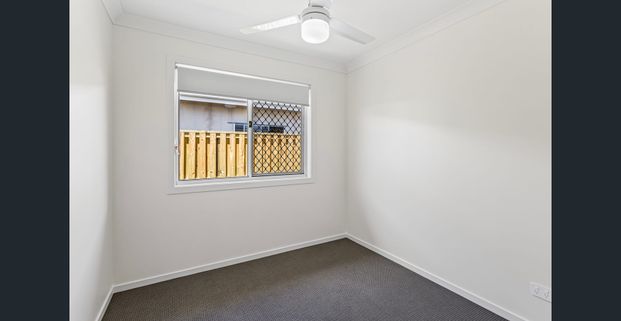 LOW MAINTENANCE AND MODERN 2 BEDROOM HOME WITH AIR CON AVAILABLE SOON! - Photo 1