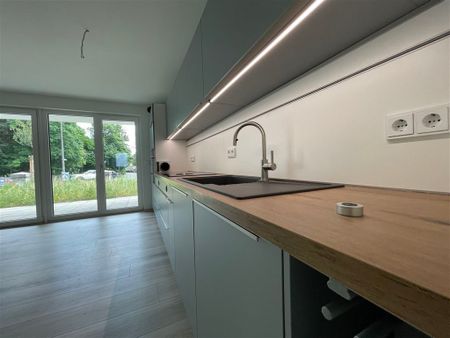 Exklusive Erdgeschoss Wohnung mit Terrasse - Photo 4