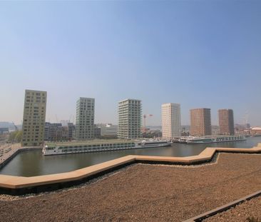 Nieuwbouw appartement met 2 slaapkamers met terras en autostaanplaats - Photo 2