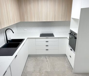 RENOVATED WATERFRONT UNIT - Photo 2