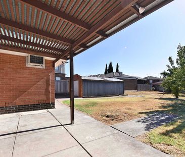 Charming 3-Bedroom Home with Large Backyard - Photo 1