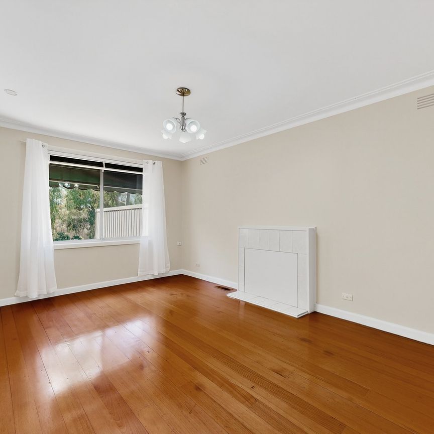 Versatile Three Bedroom Home with Multiple Living Zones - Photo 1