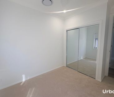 Four Bedroom Home with Media Room and Low Maintenance Yard! - Photo 4