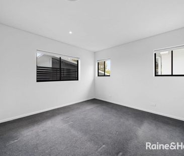 Top-Floor Luxury Unit with Ducted Air Conditioning - Photo 1