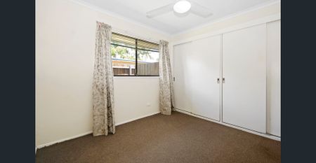 Tidy 2 Bedroom Brick Unit with AC - Photo 4