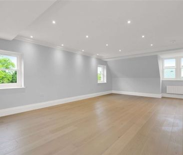 A stunning two bedroom apartment located on the upper floor of this... - Photo 1