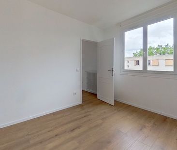 Location Appartement 4 pièces 66m² - Photo 2