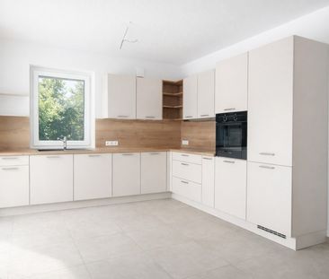 Zwei exklusive Neubau-Erdgeschosswohnungen mit überdachter Terrasse... - Foto 6