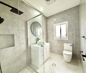 Fully Renovated Three-Bedroom Home with Carport Parking - Photo 3