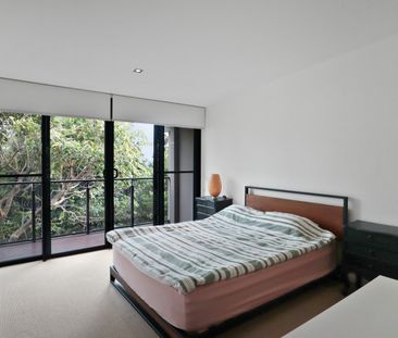 Spacious Living with Modern Comfort and Versatile Design - Photo 2