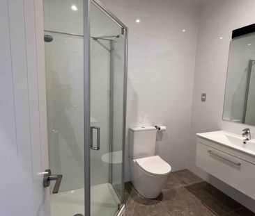 Modern 2-Bedroom Unit in Prime Location - Photo 3