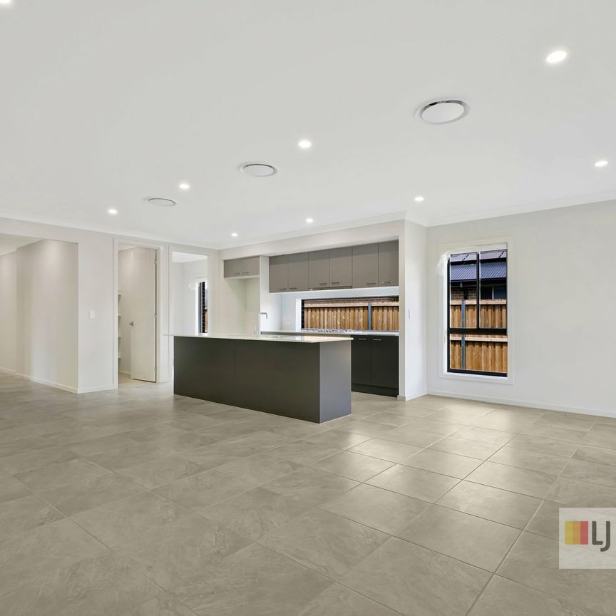 Brand New 4-Bedroom Family Home - Photo 1