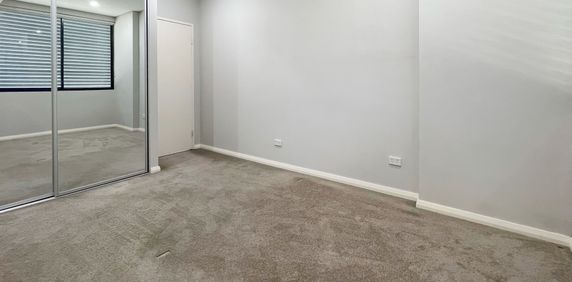 Modern two bedroom unit - 20% below market rent - Photo 2