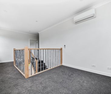 Stylish Near-New Townhouses Offering Modern, Low-Maintenance Living - Photo 5