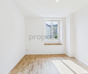 Charmante 3.5-Zimmer-Wohnung in denkmalgeschütztem Gebäude in Büsse... - Photo 3