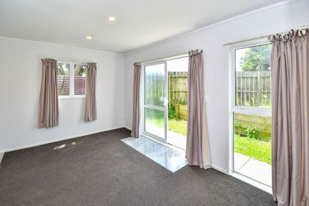 Secure family home with sleepout - Photo 2