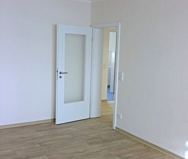 Familienfreundliche 4-Zimmer-Wohnung mit Balkon - Foto 4