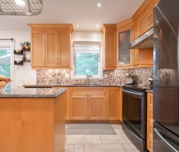 Maison de plain-pied - 7210 Place Trevi - Photo 2