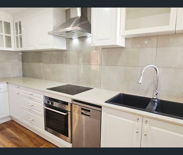 "Modern Comfort Meets City Convenience - 3-Bedroom Victoria Park Home" - Photo 1