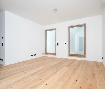 Erstbezug! 4-Zi-Gartenwohnung mit Südterrasse, EBK und TG! - Photo 1