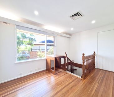 Family Haven with Space, Privacy & Dual Living Potential - Photo 6