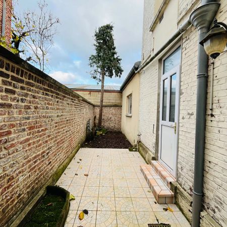 A LOUER APPARTEMENT EN RDC PROCHE CENTRE VILLE DE ST QUENTIN 02100 - Photo 4