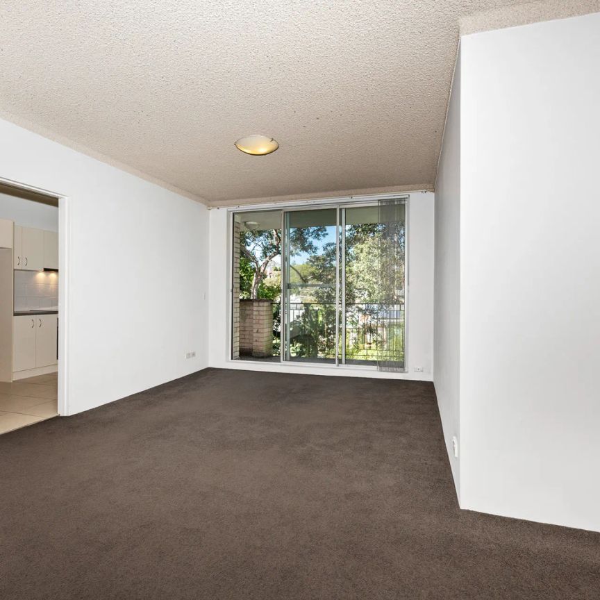 Spacious Two Bedroom Apartment with Parking in Ideal Location - Photo 1