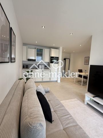 Möblierte und neu sanierte zwei Zimmerwohnung mit Einbauküche - Photo 3