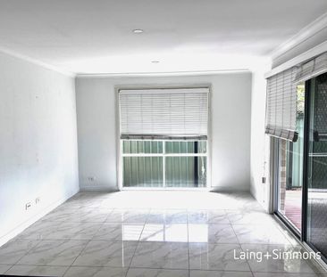 Comfortable three-bedroom home close to amenities - Photo 1