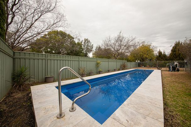 4 Bedroom Home with Pool for Rent - Photo 1