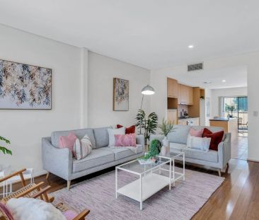 Modern 3-Bedroom Townhouse in the Heart of Mawson Lakes - Photo 4