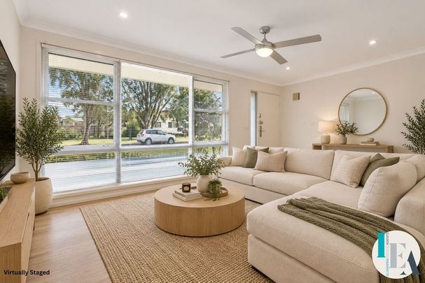 Modern Comfort Meets Family Living in a Light-Filled Home - Photo 1