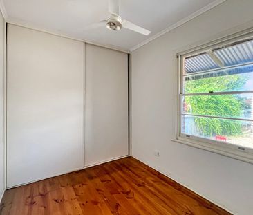 Neat 3-Bedroom Home with Built-Ins & Air Conditioning - Photo 2