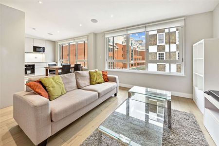 This is a very impressive modern Westminster development set in a discreet gated mews. The property comprises: 2 bedrooms, 2 bathrooms, reception, open plan kitchen, garaged parking. - Photo 2