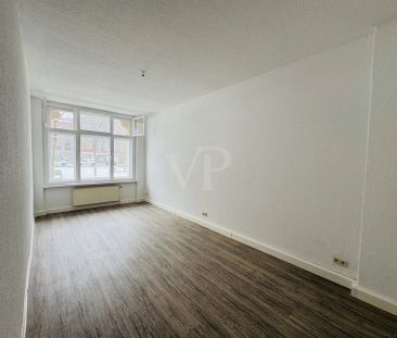 Charmante Erdgeschosswohnung in zentraler Lage - mit Einbauküche - Foto 1