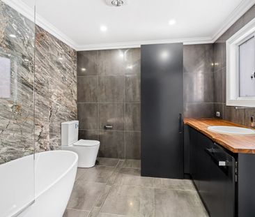 Stylish & Renovated, Parkside Living with Rear Access - Photo 5