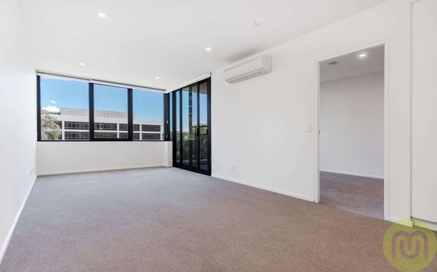 Neat and Modern Apartment in Highly Sought After Locale! - Photo 1