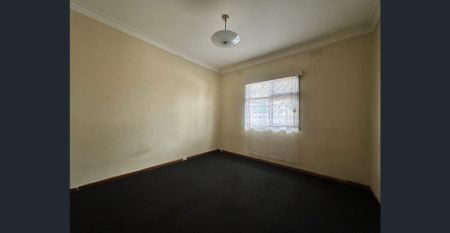 “Neat & Tidy Family Home“ - Photo 5