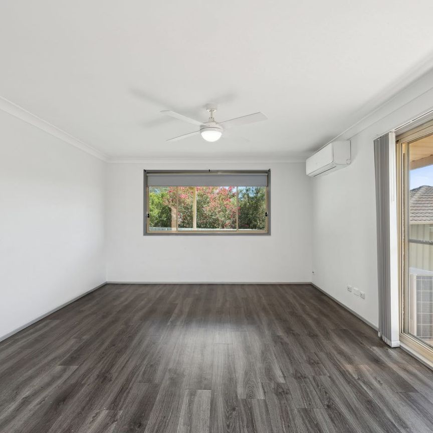 Low maintenance living in convenient location - Photo 1