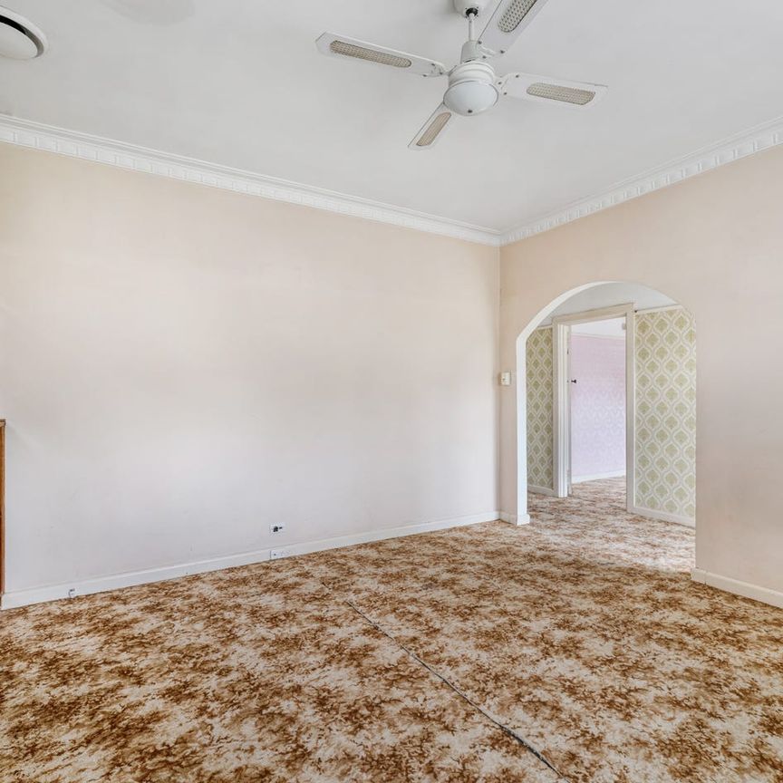 Charming Home with Spacious Layout & Established Gardens - Photo 1