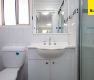 UPDATED STREET-FACING TOWNHOUSE WITH SPACE, STYLE & CONVENIENCE - Photo 3