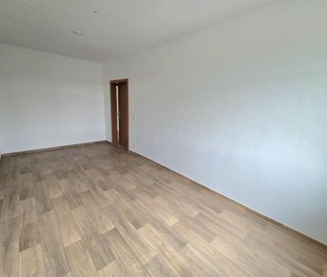 Stadtleben mit Weitblick: Moderne Dachgeschosswohnung mit Balkon un... - Foto 1