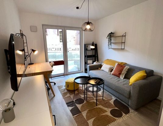 Exklusives Apartment mit Terrasse in zental gelegenem Neubau - Photo 1