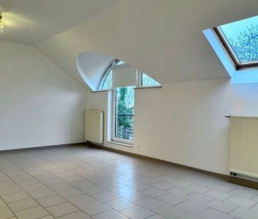 Appartement te huur in Mont-Saint-Guibert voor € 890 met 1 slaapkamer - Photo 2