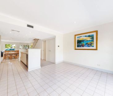 Stylish Terrace-Style Townhouse with Double Garage & Loft Retreat - Photo 4