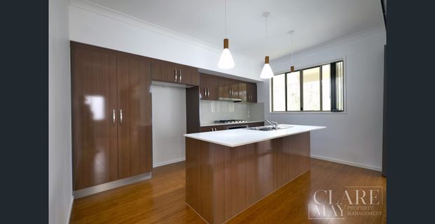 Modern Townhouse Living in Prestigious Brookwater gated community - Photo 1