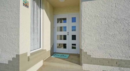 Family living in Waikiwi - Photo 4