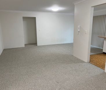 Large Two Bedroom Unit with Garage - Photo 3