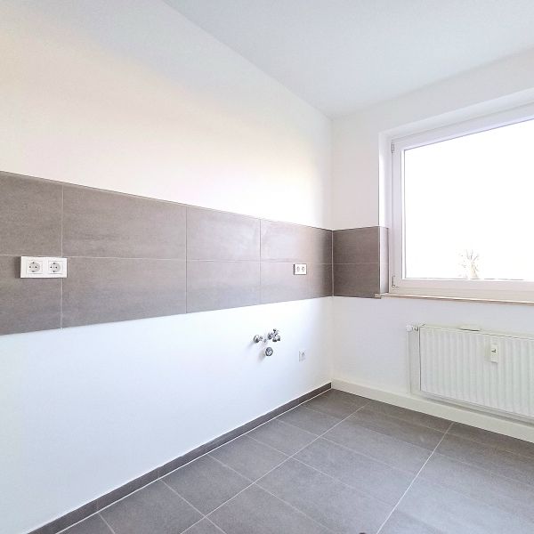 Mit frischem Fassadenanstrich! - Photo 1